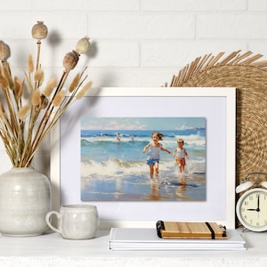 May include: A framed painting depicting two children running on a beach with waves crashing behind them. The painting is in a white frame and is hanging on a white brick wall.