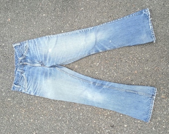 70-tals Levi's 646 Flared: Slim fit, orange flik MÄRKT 30x32, VERKLIG 28,5x30"