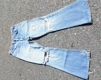 70s Levis 646 Slim Fit Flared - Faded Ice Blue Wash, Ripped Knees, Orange Tab ACTUAL 28.5x27"