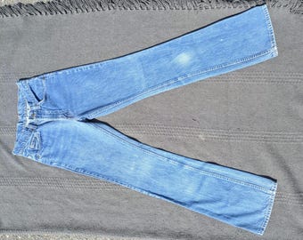 Jeansy Levi's 517 bootcut z lat 70. w stylu vintage: dopasowany krój, pomarańczowy pasek RZECZYWISTE 26x33,25"