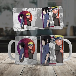 May include: White ceramic mug with a colorful design featuring two anime characters, one with black hair and the other with blonde hair. The characters are standing back to back against a red and purple background.
