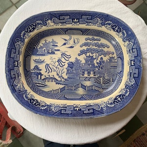Antique Blue Willow 16 inch serving platter in excellent condition.