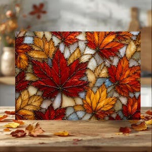 May include: A rectangular glass panel featuring a mosaic design of autumn maple leaves in vibrant shades of red, orange, and yellow. The leaves are outlined with dark metal solder lines, set against a background of translucent white glass pieces.