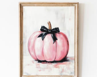 Puede incluir: Una calabaza rosa con un lazo negro sobre un fondo blanco. La calabaza está pintada en un estilo realista y tiene un acabado brillante.