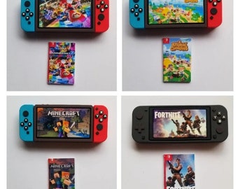 Elf props miniature Nintendo switch and game