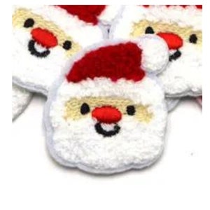 May include: A set of white, red, and yellow felt Santa Claus patches. Each patch features a smiling Santa with a white beard and a red hat.