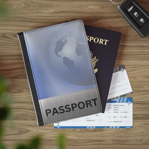 May include: A blue passport with a globe design and the word "PASSPORT" in silver lettering. The passport is on top of a blue passport holder and two airline boarding passes. The boarding passes have the text "LOREM IPSUM" and "IPSUM1234".