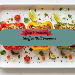 May include: A white rectangular tray holds three halves of stuffed bell peppers: red, yellow, and green. The peppers are filled with a grain mixture and garnished with lime wedges, tomatoes, and herbs. The text "Easy & Delicious Stuffed Bell Peppers" is overlaid.