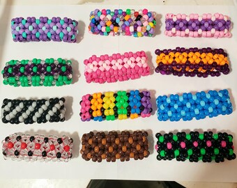 2 zufällige Kandi Manschetten