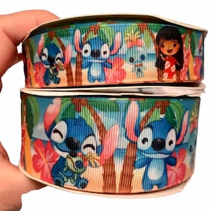 May include: Two rolls of blue, green and yellow ribbon with a tropical print featuring Stitch from Lilo & Stitch. The ribbon has a white background with palm trees, flowers, and Stitch in various poses.