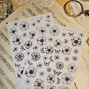 黒と白の花のステッカーシート | • スクラップブッキング • カード作り • アートジャーナリング • ペーパークラフト • ジャンクジャーナル
