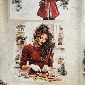 May include: Watercolor illustrations depicting winter scenes. One shows a person in a red coat walking in the snow. Another shows a person in a red sweater baking cookies. The images have a festive, holiday theme.
