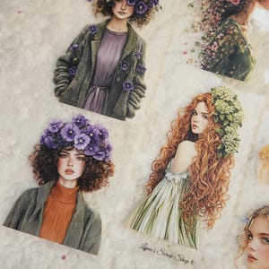May include: A set of five digital printable images featuring women with floral crowns and flowing hair. The images are in a whimsical style and would be perfect for scrapbooking, card making, or other craft projects.