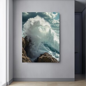 May include: A large wave crashes against rocky cliffs, creating a dramatic spray of white foam against a cloudy sky.