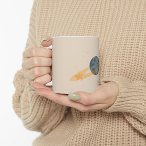 Planet with Orbiting Stars Ceramic Mug, Celestial Coffee Cup, Cozy Space-Themed Gift, Night Sky Decor