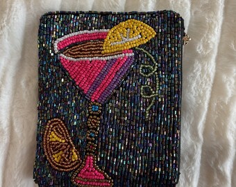 Beaded coin pouch.”