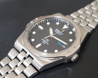 Seiko SQ Sport 100 "Nautilus" Ref. 8229-701A wristwatch