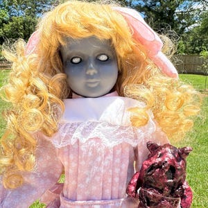 Meet Alexa! She’s a 16" tall, one of a kind, handmade repurposed porcelain doll.