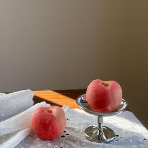 Realistic peach candle