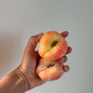 Realistic peach candle