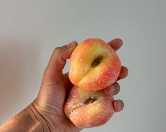 Realistic peach candle