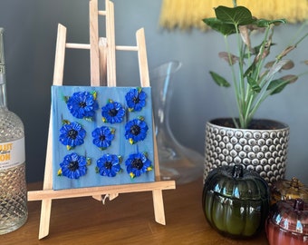 6” x 6” Thick Bouquet of Heavy Textured Black and Blue 3-D Florals on 1 1/2” Back Stappled Deep Edge Canvas *Easel not included.