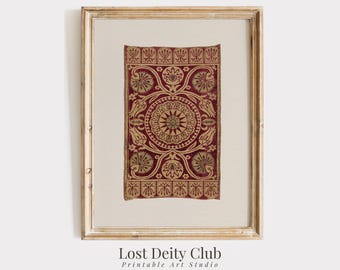 May include: A framed print of a vintage textile with a red background and gold geometric patterns. The textile features a central circular design with a starburst motif. The print is titled "Lost Deity Club Printable Art Studio".