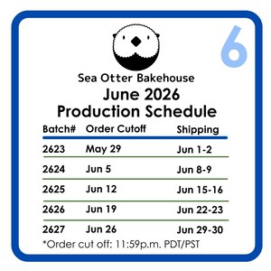 May include: A square white sign with a blue border featuring a black sea otter icon and the number 6 in the top right corner. The text reads Sea Otter Bakehouse June 2026 Production Schedule with a table listing batch numbers, order cutoffs, and shipping dates.