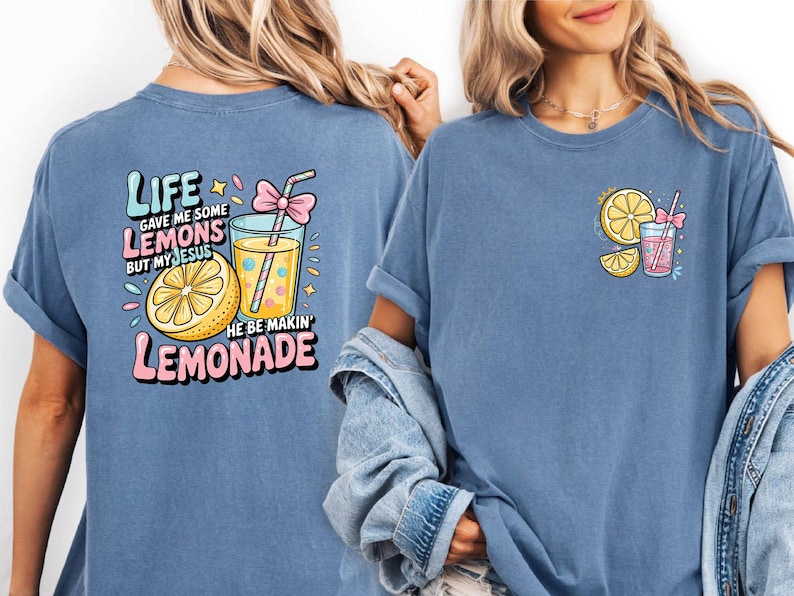 May include: Blue t-shirts with lemonade-themed graphics. One shirt features a large design on the back with text that reads "Life gave me some lemons but my Jesus he be makin' lemonade." The other shirt has a smaller design on the front.