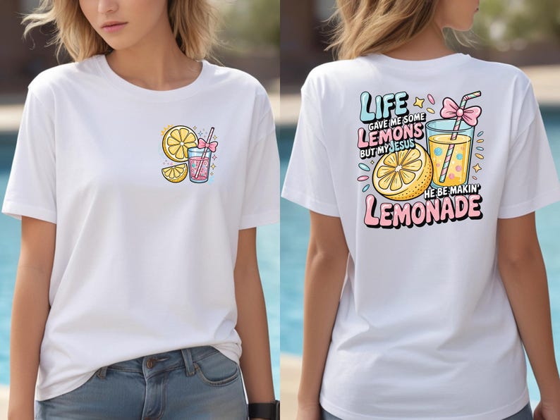 May include: White t-shirt with a colorful lemon and lemonade graphic. The front features a lemon slice and a drink with a straw. The back has the text "Life gave me some lemons but my Jesus he be makin' lemonade."