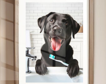 May include: A black Labrador Retriever dog with its tongue sticking out is holding a blue and white toothbrush in its mouth. The dog is sitting in a white bathroom sink with a silver faucet.