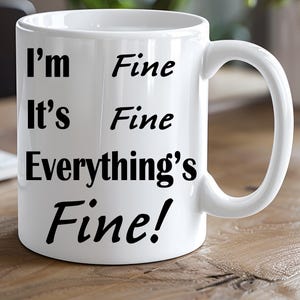 It’s Fine I’m Fine Everything’s Fine Mug – Funny Sarcastic Coffee Cup for Stress, Chaos, and Laughing Through the Madness