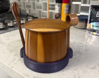 Ryze mushroom coffee accessory stand.