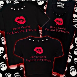 Puede incluir: Tres camisetas negras con un gráfico de boca de vampiro roja y el texto "Only a Vampire Can Love You Forever."