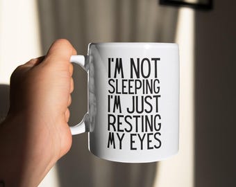 Funny Sleep Quote Mug: "Resting My Eyes" Coffee Gift