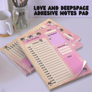 May include: Pink and beige adhesive note pads with a daily planner layout. Each pad features a schedule, top priorities, and meal plan sections, with cartoon character illustrations. The text "LOVE AND DEEPSPACE ADHESIVE NOTES PAD" is at the top.