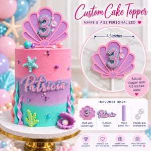 May include: A custom cake topper featuring a purple seashell with the number 3, a personalized name, and a lilac stick. The topper measures 4.5 inches wide. The set includes the shell with age, a custom name, one lilac stick, and two transparent bubble dots.