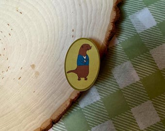 Zeeotter in vest groene vinylsticker