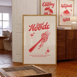 May include: A red and white poster with the text "Send Noods" in a stylized font. The poster features a red fork with spaghetti on it and the text "Specifically the saucy, twirly, carb-loaded kind that dreams are made of."
