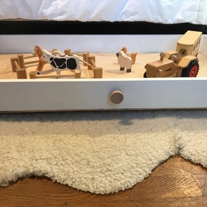Under BED TRAIN TABLE & trundle drawer: three in one, for play, storage, and organization