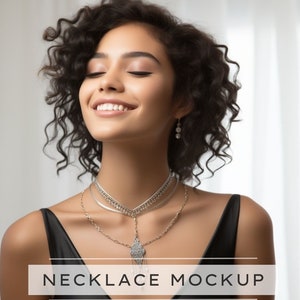 May include: A woman wearing a black dress with a silver layered necklace. The necklace has a pendant with a delicate design.