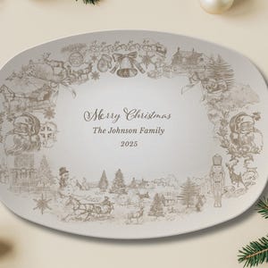 May include: Oval ceramic serving platter with a detailed sepia-toned Christmas scene. The design includes Santa Claus, a snowman, and a horse-drawn sleigh. The text reads "Merry Christmas, The Johnson Family, 2025".