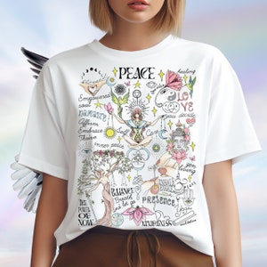 May include: White t-shirt with a colorful graphic design featuring the word "PEACE" and various symbols and phrases related to mindfulness, self-care, and inner peace. The design includes elements like a tree, a lotus flower, a yin-yang symbol, and the words "namaste", "balance", "presence", and "mindfulness".