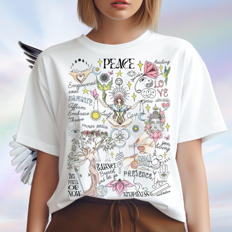 May include: White t-shirt with a colorful graphic design featuring the word "PEACE" and various symbols and phrases related to mindfulness, self-care, and inner peace. The design includes elements like a tree, a lotus flower, a yin-yang symbol, and the words "namaste", "balance", "presence", and "mindfulness".