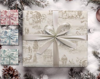 Könnte beinhalten: Weihnachtsgeschenkpapier mit cremefarbenem Hintergrund und einem Toile-de-Jouy-Design mit Weihnachtsmann, Rentieren und Winterszenen. Das große Geschenk ist mit einem cremefarbenen Satinband gebunden. Kleinere Geschenke sind in rotes, blaues und grünes Papier mit passenden Bändern verpackt.