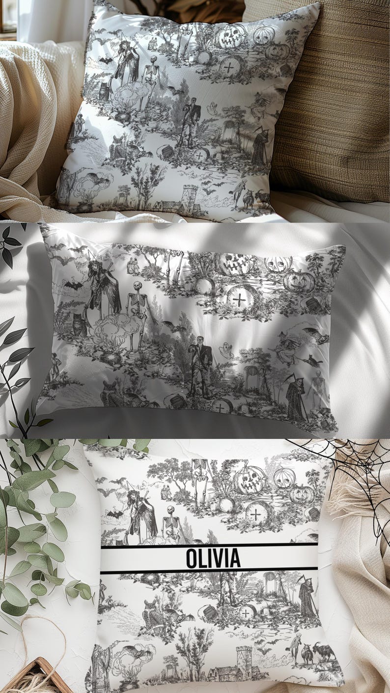 May include: Three white throw pillows with a black and white Halloween-themed toile pattern. The pillows feature images of skeletons, pumpkins, bats, and other spooky elements. The middle pillow has the name "Olivia" printed on it.