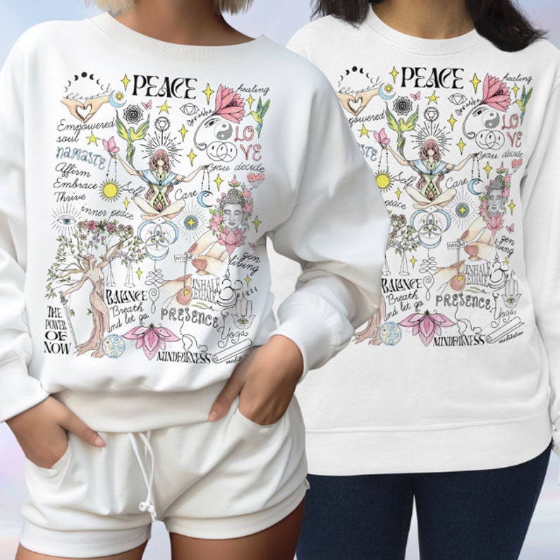 May include: White sweatshirt with a colorful graphic print featuring the word "PEACE" and various symbols related to mindfulness, yoga, and self-care. The graphic includes phrases like "inner peace", "balance", "breathe", "presence", and "mindfulness".