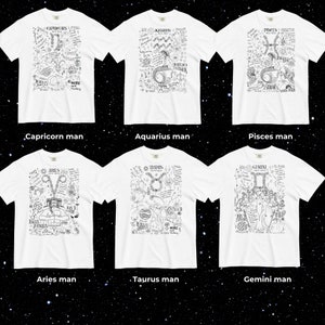 Peut inclure: Six t-shirts blancs avec des motifs graphiques noirs repr&eacute;sentant les signes du zodiaque : Capricorne, Verseau, Poissons, B&eacute;lier, Taureau et G&eacute;meaux. Chaque t-shirt pr&eacute;sente des illustrations et du texte d&eacute;taill&eacute;s. Le texte "MORE Today" est visible sur certains.