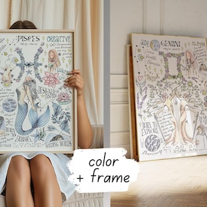 a woman sitting on a bed holding up a picture