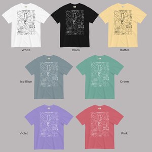May include: A set of ten t-shirts in various colors, each featuring a white graphic print of a zodiac sign with the word "Capricorn" above it. The colors include white, black, butter yellow, ice blue, green, violet, and pink.